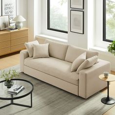 a living room scene with focus on the couch and coffee table in the foreground