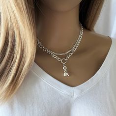 Awesome elegant and feminine shiny silver double strand necklace that can be worn chic or casual .  Its arrangement of 3mm and 6mm curb chain, with delicate padlock and key charms gives this necklace beautiful trendy look. Both chains are united to a ring behind the neck and it attaches with a lobster clasp. This necklace is all in quality thick silver color plated stainless steel. The padlock is 13.5x8x5mm and key charm 12x6x1mm, also in quality thick silver color plated stainless steel. On pic Silver Double Chain Charm Necklaces, Silver Double Chain Charm Choker, Silver Double Strand Charm Necklace With Double Chain, Silver Double Strand Charm Necklace, Trendy Silver Charm Necklace With Double Chain, Silver Dainty Double Chain Charm Necklace, Silver Dainty Charm Necklace With Double Chain, Dainty Silver Double Chain Charm Necklace, Dainty Silver Charm Necklace With Double Chain