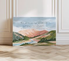 a watercolor painting with the words, to live by perspective and mountains in the background