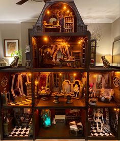 We had the MOST fun making this haunted house! Mostly Dollar Tree furniture and lots of polymer clay accessories Haunted Dollhouse Furniture Diy Ideas, Haunted Dollhouse Makeover, Goth Dollhouse Diy, Gothic Dollhouse Diy, Doll House Haunted House Diy, Haunted Halloween Dollhouses