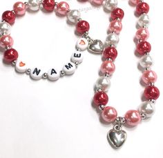 Valentine heart jewelry for kids. Glass pearl necklace and bracelets set w heart charm and personalized name bracelet. Valentine's Day Gift Necklace Photography, Wild Jewelry, Necklace Repair, Jewellery Shops, Valentine Jewelry, Jewelry For Kids, Valentines Bracelets, Beads Style, Easter Jewelry