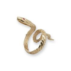 Slither is Designed and handcrafted by Heirloom Pavé. This Serpent ring is crafted in 14k yellow gold. The eyes hold approx. .03ct Red Rubies. This Snake sleekly wraps around the whole finger and continues the designed texture all the way around. It is a nice and weighty ring, at 7.27 grams of 14K yellow gold. The long shape really elongated the fingers. Size 7. This ring has been inspected for authenticity by a Certified Gemologist & Master Jeweler. FOLLOW US TO SEE MORE PHOTOS OF OUR JEWELRY O 14k Gold Snake Ring, Luxury 14k Gold Snake Ring, Luxury Hallmarked Gold Snake Ring, 14k Gold Snake-shaped Ring, Unique Gold Snake-shaped Rings, Luxury Antique Yellow Gold Snake Ring, Antique Hallmarked Snake Ring, Serpent Jewelry, Antique Gold Snake-shaped Jewelry