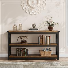 a book shelf with books on it in front of a wall clock and other items