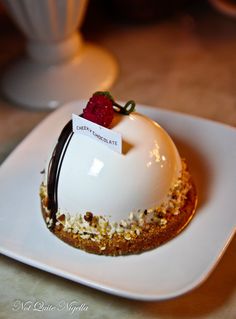 a small dessert is sitting on a white plate