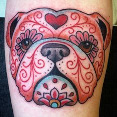 a dog with a heart on its face is shown in this colorful tattoo art design