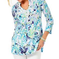 Lily Pulitzer Kaia Knit Tunic In Multicolor Resort White/Shell Beach Colors Include White, Blue, Pink, Green, And Lavender/Lilac 100% Cotton, 3/4” Length, Side Slits Size. Xxs Brand New With Tag Stretch Tops For Vacation, Stretch Blouse For Spring Vacation, Floral Print Stretch Blouse For Vacation, Stretch Floral Print Blouse For Vacation, Floral Stretch Blouse For Vacation, Multicolor Tops For Spring Holiday, Multicolor Tops For Holiday And Spring Season, Beachy Blouse For Spring Vacation, Spring Vacation Beachy Blouse