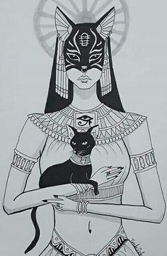 an egyptian woman holding a cat in her hands