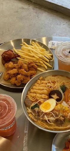 a table topped with lots of food and drinks