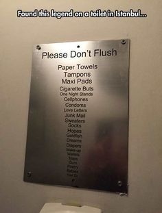 a sign on the wall that says please don't flush paper towels tamps max pads