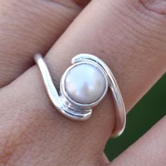 Beautiful Pearl Ring,Cultured South Sea Pearl Ring,Solid 925 Sterling Silver White Gemstone Ring,Handmade Jewelry,Promise Ring,Gift for her Gemstone : Pearl Stone Shape : Round Stone Color : White Stone Dimension (Approx) : 7 x 7 mm Ring Sizes : All Size Rings Available If you want to set the stones in 925 Solid Sterling Silver Like as earrings, pendant , Ring. I am always ready to make your custom design jewelry. Please contact me. --------------------------------------------------------------- Minimalist Promise Ring, Pearl Ring Design, White Pearl Ring, Ring Pearl, Pearl Stone, Promise Ring Gift, Pink Gemstones, Sea Pearls, Pearl Gemstone