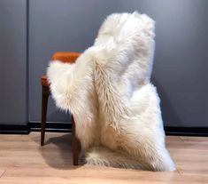 a chair that has some fur on it