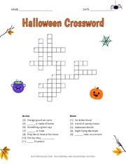 halloween crossword puzzle with pumpkins and spider web on the page, which is filled with words