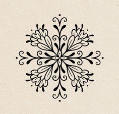 a black and white snowflake with swirls on it