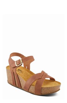 A cork-wrapped platform and chunky wedge heel elevate a weekend-ready leather sandal fitted with an adjustable strap at the ankle. 1 3/4" heel; 1 1/4" platform Adjustable ankle strap with hook-and-loop closure Molded footbed Leather upper and lining/synthetic sole Made in Spain Open Toe Cork Wedge Sandals With Heel Strap, Cork Wedge Sandals With Heel Strap And Round Toe, Cork Wedge Sandals With Heel Strap, Cork Sandals With Heel Strap And Wedge Heel, Cork Wedge Sandals With Removable Insole And Ankle Strap, Cork Wedge Sandals With Buckle Closure, Cushioned Cork Wedge Sandals With Round Toe, Adjustable Round Toe Wedge Sandals With Cork-bed Midsoles, Cork Platform Sandals With Round Toe