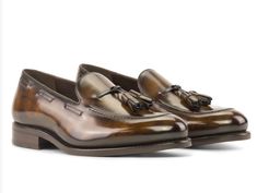 Step into unparalleled sophistication with our Handcrafted Tobacco Patina Loafers, a testament to the timeless elegance of traditional English craftsmanship. Key Features: Materials: Tobacco Patina leather exterior, exuding a rich and distinctive aesthetic. Sole: Brown Goodyear Welt Leather Sole, ensuring durability and a touch of classic charm. Last: Zurigo Last, presenting a rounded toe for that quintessential traditional English look. Artisan-Hand Made Patina: The Anticatura technique, master Classic Slip-on Leather Wedding Shoes, Timeless Formal Tassel Loafers With Leather Lining, Brown Leather Sole Loafers For Wedding, Timeless Tassel Loafers With Leather Lining For Semi-formal Occasions, Timeless Semi-formal Tassel Loafers With Leather Lining, Luxury Brown Dress Shoes For Wedding, Timeless Round Toe Tassel Loafers For Formal Occasions, Timeless Tassel Loafers With Round Toe For Formal Wear, Fitted Elegant Loafers For Formal Occasions