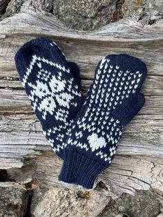 "These mittens have a fantastic fairisle snowflake pattern that looks best in contrasting colors. The have an extra long band so they stay under coats and sweaters easily. The front body of the mitten has so much visual interest with the big snowflake and other designs that surround it. The palm of the mitten is equally as interesting. It has a sweet heart followed by a dotted pattern the entire way up. They are warm, comfy, cozy and fun.  They are easy to move in and warm.  It uses worsted weight yarn, size US 7 and US 8 needles. Gauge 18 sts x 19 rows = 4x4 square with US 8 These make a great accessory for yourself or a wonderful gift!  Size fits most adult women's hand. 10\" long by 4\" wide." Nordic Fair Isle Winter Patterns, Hand Knitted Scandinavian Patterns For Winter, Scandinavian Knitted Winter Patterns, Scandinavian Knitted Patterns For Winter, Scandinavian Hand Knitted Winter Patterns, Scandinavian Style Hand Knitted Winter Patterns, The Mitten, Sweater Mittens, Patchwork Blanket