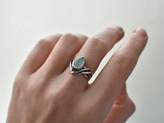 Blue Elven Ring in a size 7 (US) - a true fantasy silver delight! This proposal ring made of: - sterling silver (Ag 925), - blue chalcedony. MEASUREMENTS Ring size: 7 (US), O (UK), 55 (FR) Inner diameter: 17.6 mm Ring weight: 3.2 g  The fantasy ring was oxidized and polished to give it a more deep and magical look. You will receive the engagement ring in a gift-box with a magnetic clasp. This elvish ring is ideal for all the modern-day elves out there, perfect for an otherworldly proposal or a G Elvish Ring, Elven Ring, Blue Chalcedony Ring, Gothic Engagement Ring, Fantasy Ring, Elven Jewelry, Chalcedony Ring, Gothic Rings, Tree Of Life Pendant