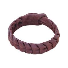 For this accessory Thai artisan Khun Boom selects two wristbands of brown leather that she braids together to create the appearance of several links that circle the wrist. This bracelet brings a smooth style wherever it goes. Brown Leather Braided Jewelry, Braided Brown Leather Jewelry, Brown Braided Leather Jewelry, Adjustable Hand Wrapped Leather Bracelet, Brown Braided Leather Bracelets, Brown Leather Braided Bracelet, Handmade Leather Braided Bracelets, Adjustable, Handmade Adjustable Leather Braided Bracelets, Adjustable Brown Bracelet With Wrist Strap