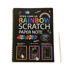 a spiral notebook with rainbow scratch paper notes