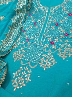 Item Overview ATHARVA Hand Embroidered Salwar Kameez Blue/Gota Patti Chiffon Dupatta/Custom Stitch Unstitch/Anarkali/Churidar/Plazzos/Patiala/ Dno. CH1581 Fabric: * Shirt Chanderi Silk - Embroidered Jaal/ 2.5 Mts Beautiful Hand Embroidery * Dupatta: Chiffon Chinnon Dupatta 2.5 Mts- Gota Patti Work * Bottom Santoon Silk 2.5 Mts. Excusive Hand Embroidered Party Wear Punjabi Suit. Customization: * Fabrics Customization: Designs Can be made in different Fabrics. *Color Customization: Designs Can be Blue Semi-stitched Churidar With Resham Embroidery, Designer Blue Anarkali Set With Mirror Work, Blue Chanderi Anarkali Set With Mirror Work, Blue Anarkali Set With Mirror Work In Chanderi, Blue Anarkali Salwar Kameez With Mirror Work, Blue Georgette Lawn Suit For Wedding, Blue Anarkali Set With Mirror Work For Diwali, Diwali Blue Anarkali Set With Mirror Work, Semi-stitched Blue Anarkali With Mirror Work