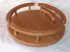 a wooden tray with two handles on it