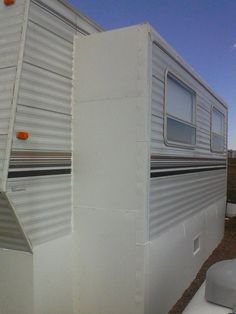 an rv parked on the side of a road