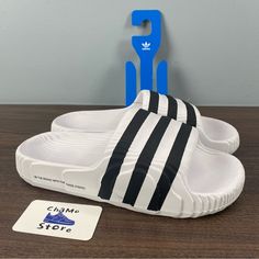 Brand New. Never Worn. No Box . I Carefully Package And Ship Immediately. Let Me Know If You Have Any Questions. Men Sz 10,11 Ship Same Or Next Business Day! 100% Authentic! Touch The Follow Bottom To Get Updated Every Day About New Deals. White Slip-resistant Slide Sandals, White Slip-resistant Synthetic Sport Sandals, White Slide Sneakers For Summer, Adidas Sporty Flat Slides, Sporty Flat Adidas Slides, White Sporty Slip-resistant Sandals, Sporty White Slip-resistant Sandals, Casual White Adidas Sandals, Adidas Non-slip Sandals For Streetwear