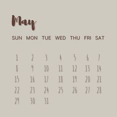 a calendar with the word july written in brown ink on a light gray wallpaper