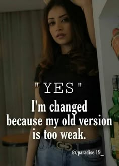 a woman standing in front of a shelf with bottles on it and the words yes i'm changed because my old version is too weak