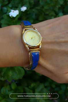 Gorgeous and unique, this is the perfect piece for you. As you can see, the detail is amazing! This women's watch is a wonderful example of Native American tradition and culture. It is handcrafted from 12KGF and Sterling Silver. The tips of this watch are precisely inlaid with Lapis which go great with the gold-tone. Such an impeccable gift to yourself or someone special! Native American Watches, Native American Traditions, Women's Watch, Statement Pieces, Elegant Design, Womens Watches, Beautiful Jewelry, Native American, Jewelry Accessories