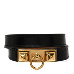 This is an authentic HERMES Swift Rivale Double Tour Bracelet size S in Black. This stylish bracelet is crafted of leather in black and wraps around the wrist twice with a gold plated fixturewith two studs and a ring. Hermes Bracelet, Hermes Box, Stylish Bracelet, Bracelet Sizes, Swift, Gold Plate, Bracelet, Ring, Leather