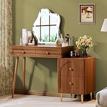 a bedroom scene with focus on the dressing table and mirror, which is decorated in green