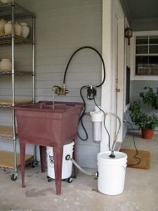 a bucket is sitting on top of a cart