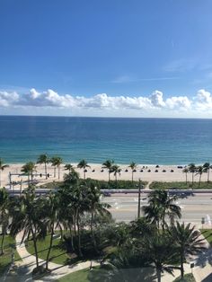 an aerial view of the beach and ocean from a high rise building in miami, florida