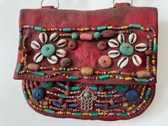 Handmade vintage Moroccan Berber Leather bag with beads  26 x 22 cm Handmade Red Bags For Festivals, Handmade Festival Pouch Bags, Red Handmade Shoulder Bag For Festivals, Handmade Pouch Satchel For Festival, Vintage Handmade Shoulder Bag For Festivals, Handmade Vintage Shoulder Bag For Festivals, Handmade Vintage Satchel For Festival, Vintage Hand-stitched Shoulder Bag For Festivals, Handmade Festival Pouch Satchel