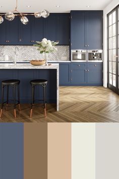 a kitchen with blue cabinets and wooden floors