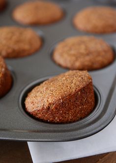 a muffin in a pan on top of a table