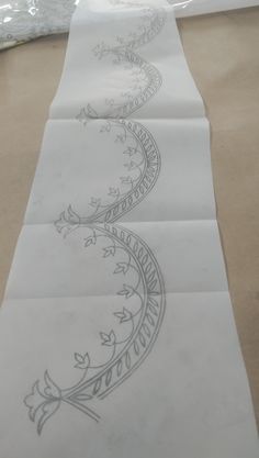 some white paper with designs on it