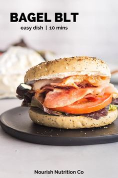 the bagel blt sandwich is ready to be eaten