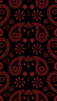 a red and black background with an intricate design