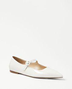 Elevate your style with the Ann Taylor Patent Mary Jane Flats, a chic reinterpretation of a timeless design. These flats feature:

- Size: 8
- Color: Winter White
- Material: Leather
- Gender: Female
- Pointy toe silhouette
- Stylish side button detail at the vamp
- Comfortable 1/4" heel height

Crafted from high-quality patent leather, these flats are perfect for adding a touch of elegance to any outfit. Whether paired with office attire or casual weekend wear, these Mary Jane flats are sure to Leather Mary Jane Flats, Knitted Suit, Style Steal, Casual Weekend, Mary Jane Flats, Office Attire, Leather Mary Janes, Weekend Wear, Winter White