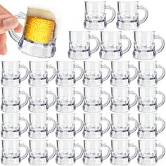 beer mugs are lined up next to each other with the same amount in them