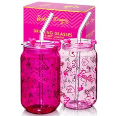 two pink mason jars with straws in them and a box for the same product