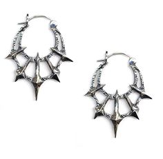 Add some gothic style to your wardrobe with these unique Chaos Earrings. Made in sterling silver, these earrings feature 5 spikes contrasted by a heavy textured crescent. Dimensions These earrings are 45mm long x 36mm wide and 5mm thick Each earring weighs approximately 6.5grams Grunge Jewelry Earrings, Punk Ear Piercings, Spike Accessories, Sharp Jewelry, Alt Earrings, Alt Jewelry, Spiked Jewelry, Edgy Earrings, Goth Earrings