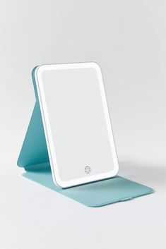 a mirror sitting on top of a blue mat