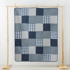 PRICES MAY VARY. CLASSIC PLAID DESIGN: The Midnight Plaid quilt boasts a timeless checkered pattern, artfully blending white, blue, and navy to create a sense of traditional elegance and comfort. Its classic appeal brings a calming and welcoming atmosphere to any space. PREMIUM QUALITY: Made with a 100% cotton shell and a 70% cotton and 30% polyester fill, this quilt offers a soft touch and outstanding comfort. The durable, high-quality materials ensure this throw will be a staple in your home for years to come. VERSATILE FUNCTIONALITY: Perfectly sized at 50" x 60", this quilted throw is ideal for staying cozy on chilly nights, layering over bedding for extra warmth, or adding a stylish accent to your living area. Its lightweight nature makes it versatile for all seasons. EASY CARE: Design White And Blue Pattern, Patchwork Throw, Quilted Throw, Quilted Throw Blanket, Lap Quilt, Country Farmhouse, Throw Quilt, Blue Pattern, Throw Blanket