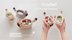 the crochet cat storage pendentnt is made out of yarn and beads