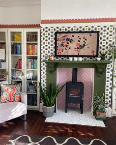 a living room filled with furniture and a fire place next to a bookshelf