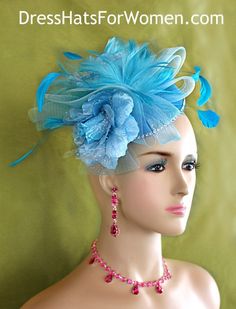 Women’s Turquoise Blue Sinamay Straw Rhinestone Flower And Feather Fashion Designer Haute Couture Hat Headpiece Wedding Fascinator Hair Accessory. Two Beautiful Silk Light Blue Millinery Flowers Are Placed On A Deep Turquoise Blue Simulated Sinamay Straw Round Base, Trimmed With An Aqua Turquoise Blue Horsehair Crinoline Bow. Expensive Hand Dyed Turquoise Blue Hackle Feathers Are Placed Within The Bowing. Long Turquoise Blue Shooting Coque Feathers Top Off This Gorgeous Headpiece. A Single Row O Custom Made Hats, Feather Fashion, Royal Ascot Hats, Couture Hats, Ascot Hats, Spring Racing, Wedding Fascinators, Kentucky Derby Hats, Unique Hats