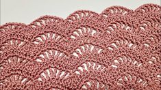 the crochet pattern is shown in pink